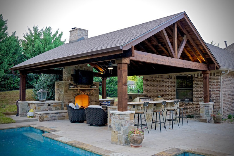 Outdoor-Living-Contractor-Custom-patio-with-outdoor-Kitchen-outdoor-fire-place-and-seperate-seating-area-with-fire-pit-in-The-Woodlands-Texas.-JM-Outdoor-Living