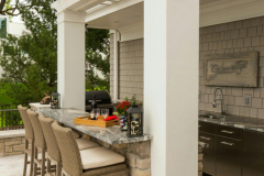 Outdoor-kitchen-bar-with-attcheed-pergola-in-The-Woodlands-Texas.-JM-Outdoor-Living